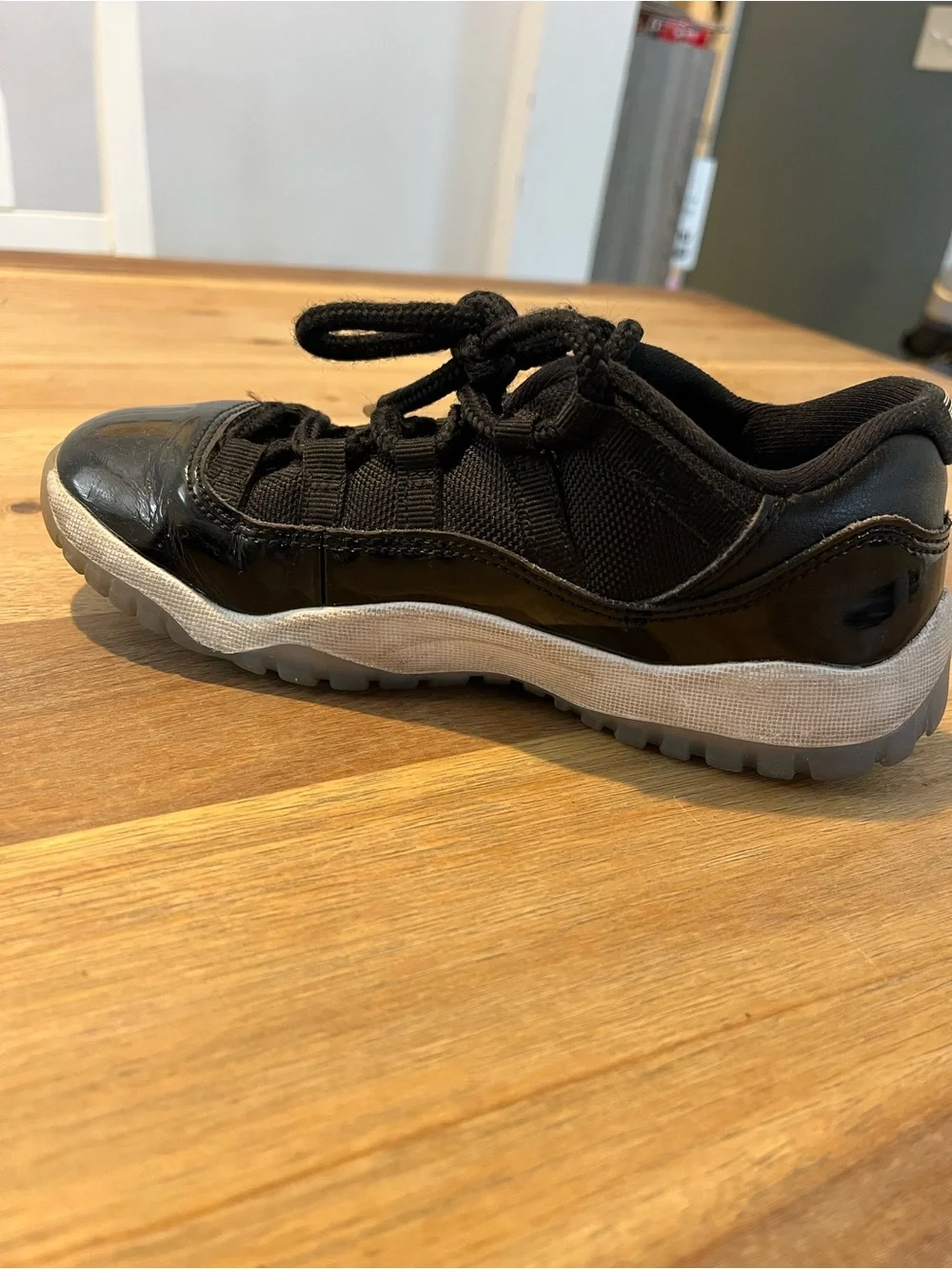 Jordan Black Low-Top Patent Leather Sneakers